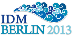 Logo der IDM 2013 - Aufsch&auml;umende Wellen und Schriftzug IDM BERLIN 2013